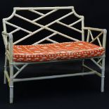 Vintage Painted Rattan Loveseat. Unsigned. Rubbing, minor paint losses and surface wear. Measures