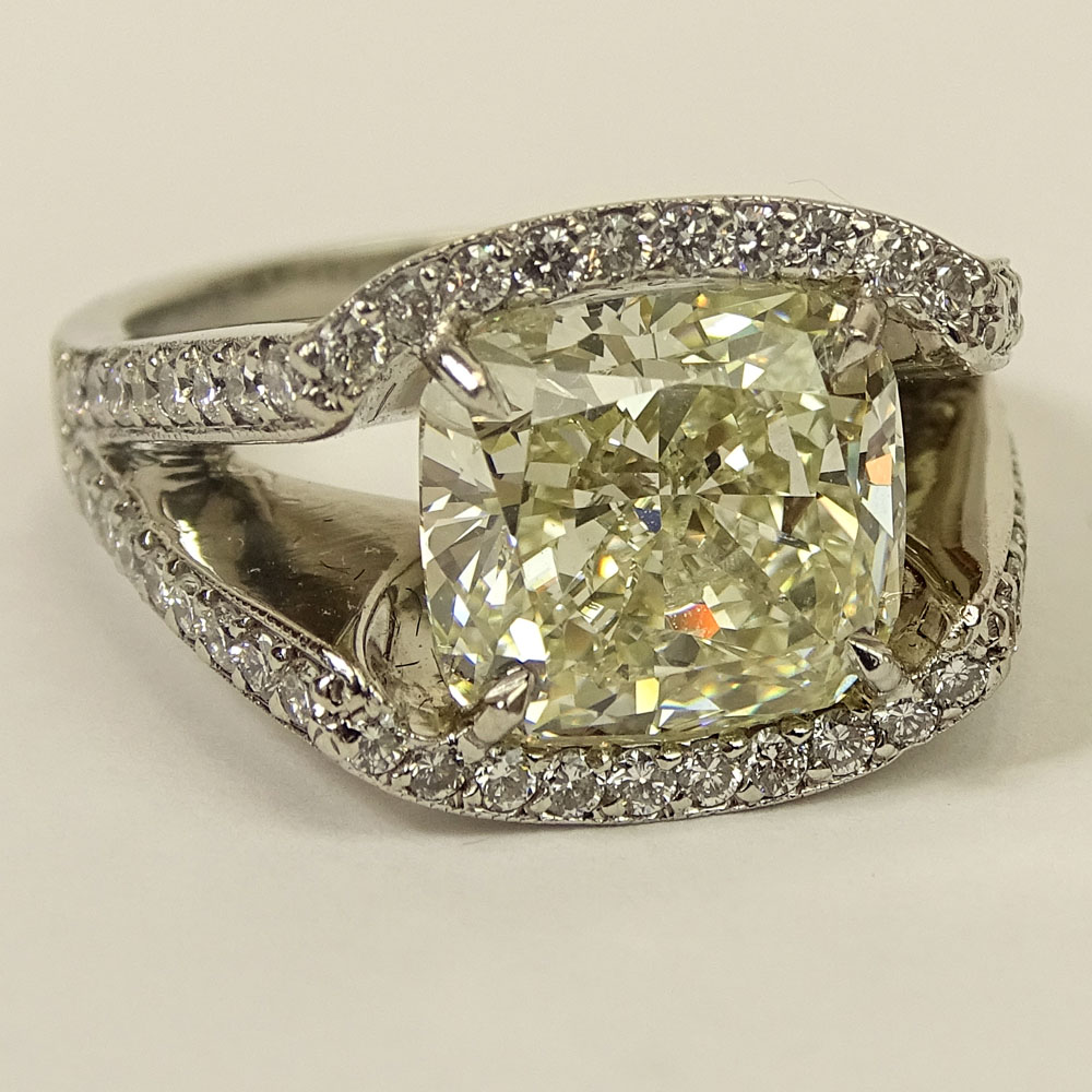 Important Approx. 7.01 Carat Cushion Cut Diamond and Platinum Ring accented with Micro Pave Set