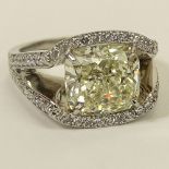 Important Approx. 7.01 Carat Cushion Cut Diamond and Platinum Ring accented with Micro Pave Set