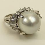 Lady's South Sea Pearl, Approx. 1.25 Carat Diamond and Platinum Ring. Pearl measures 13mm.