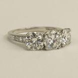 Tiffany & Co Three (3) Stone Diamond and Platinum Ring. Center stone measures 6.8 x 4.0mm, approx.