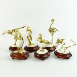 Boxed set of Ivory and 18K Gilt Metal Exotic Bird Figurines. Each bird hand carved and mounted in