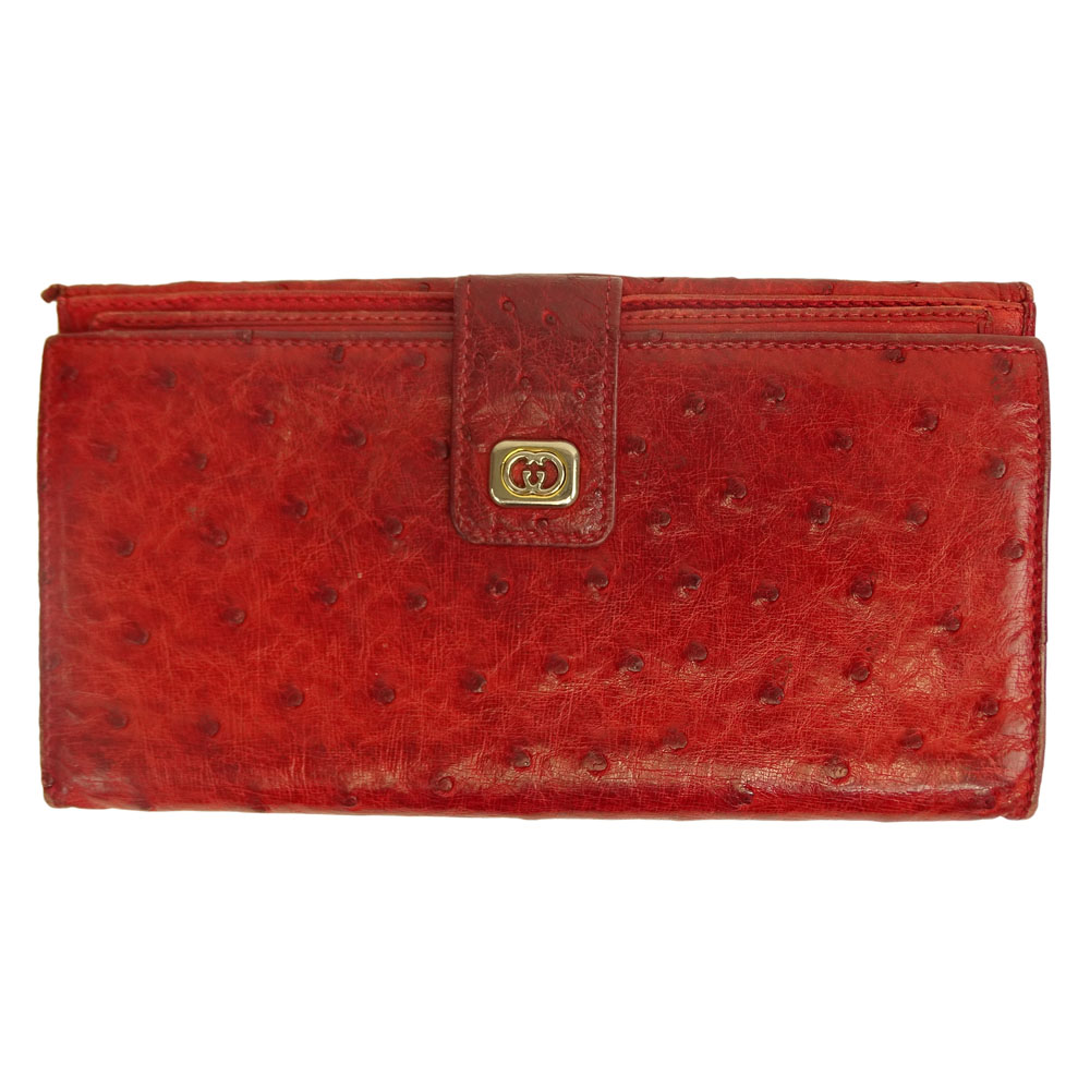 Retro Gucci Red Ostrich Leather Clutch Wallet. Marked with Gucci Monogram Logo Snap, and Gucci Metal