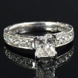 AIG Certified 1.39 Carat Diamond and 18 Karat White Gold Engagement Ring set in the center with a .