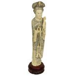 Antique Chinese Carved Ivory Empress Figure on Carved Wood Base, Unsigned. Measures 12" H, 2-1/2" W.