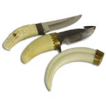 Three piece lot of ivory. Included a carved Ivory handled hunting knife in an eagle motif with