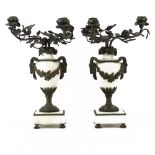 Pair of 19/20th Century Bronze Mounted Marble Urn Shaped Candelabra. Figural and floral mounts.