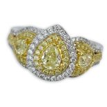 Approx. 1.0 Carat Fancy Yellow Diamond, .36 Carat Round Brilliant Cur Diamond and 18 Karat White