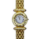 Lady's Vintage Chopard 18 Karat Yellow Gold Bracelet Watch with Diamond Accents and Quartz Movement.