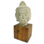 Vintage Thai Carved Stone Buddha Head. On wood block. Unsigned. Split on Stand or good condition.