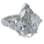 EGL Certified 7.97 Carat Diamond and Platinum Engagement Ring Set in the Center with a 6.77 Carat