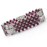 Van Cleef & Arpels style approx. 51.0 Carat Oval Cut Ruby, 7.0 Carat Baguette and Pave Set Diamond