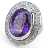 Large Oval Shape Amethyst, Round Brilliant Cut Diamond, and 14 Karat White Gold Ring. Amethyst