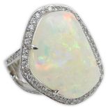 Large White Opal, Round Brilliant Cut Diamond, Blue Diamond and 18 Karat White Gold Ring. Opal