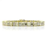 Stunning Diamond, Platinum and 18 Karat Yellow Gold Bracelet Set with Twenty-One (21) Cushion Cut