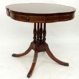 Mid Century English Regency Style Faux Leather Top Mahogany Drum Table. Some scratches, rubbing or
