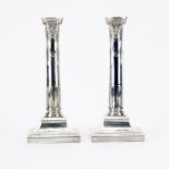 Pair of Weighted Sterling Silver Candlesticks. Signed 925/1000 Sterling. Small dings. Measures 9-1/