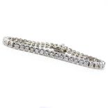 Approx. 6.0 Carat Round Brilliant Cut Diamond and 14 Karat White Gold Line Bracelet. Diamonds F-G-