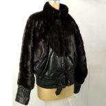 Vintage Jacques St. Laurent Black Mink and Leather Bomber Style Jacket. Labeled. Worn leather, light