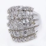 5.58 Carat Round Brilliant Cut and Tapered Baguette Diamond and 18 Karat White Gold Ring. Diamonds