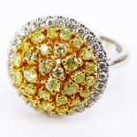 .91 Carat Natural Fancy Yellow Diamond, .35 Carat Round Diamonds and 18 Karat White Gold Dome