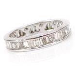 2.44 Carat Baguette Cut Diamond and Platinum Eternity Band. Diamonds H-I color, SI1-SI2 clarity.