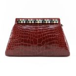 Judith Leiber New York Red Crocodile Skin Clutch Purse. Rare pull locking mechanism. Company name