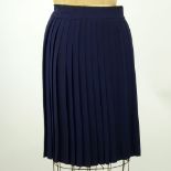 Yves Saint Laurent Rive Gauche Pleated Wrapped Skirt. Navy blue wool fabric with black braid trim,