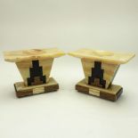 Pair of French Art Deco Marble Coupes. Decorated with formed tan, black, and brown marble pieces