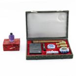 Grouping of Amethyst Snuff Bottle and Calligraphy Brush Writing Set. Both are in original boxes.