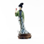 Japanese Enamel and Ivory Geisha Figurine. Depicts Geisha in traditional garb with ivory face and