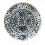 Antique Chinese Ming Dynasty Blue and White Porcelain Dish. Blue glazed floral motif on surface.