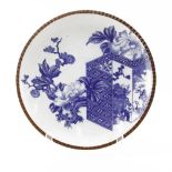 19/20th Century Japanese Arita Porcelain Charger with Brown Trim. Decorated blue glaze flower