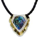 Large Black Opal, Platinum and 18 Karat Yellow Gold Pendant Necklace accented with Round Brilliant