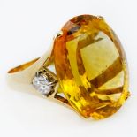 Large Oval Cut Citrine, Diamond and 18 Karat Yellow Gold Ring. Citrine measures 22mm x 17mm. Stamped