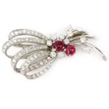 French Circa 1930 Approx. 2.50 Carat Diamond, 1.0 Carat Cabochon Ruby and Platinum Brooch. French