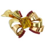 Circa 1940s Mauboussin Cabochon Ruby, Large Citrine and 14 Karat Yellow Gold Brooch. Stamped