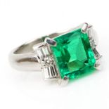 Approx. 2.31 Carat Emerald Cut Emerald and Platinum Ring accented with .30 Carat Baguette and