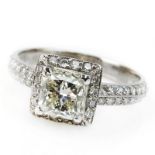 Approx. 1.51 Carat Princess Cut Diamond and 18 Karat White Gold Engagement Ring accented