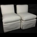 Pair of Mid Century White Upholstered Slipper Chairs. Loose seat cushion and back rest. Blue Water