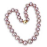 Single Strand Graduated Lavender Pearl Necklace with 14 Karat Gold Clasp. Pearls measure 12mm to