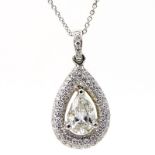 Approx. .98 Carat Pear Shape Diamond and 18 Karat White Gold pendant accented with .54 Carat Round