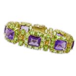 Retro Circa 1950s Amethyst, Peridot, Citrine and 14 Karat Yellow Gold Bracelet. Good quality