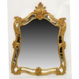Large Decorative Giltwood Mirror. Probably Italian. Unsigned. Very good condition. Measures 50" H