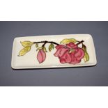 A rectangular 'Pink Magnolia' pen tray by Moorcroft CONDITION REPORT; Available on request.