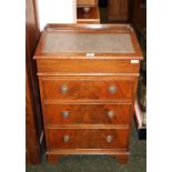 A reproduction mahogany Davenport writing desk with metamorphic top and three drawers below in