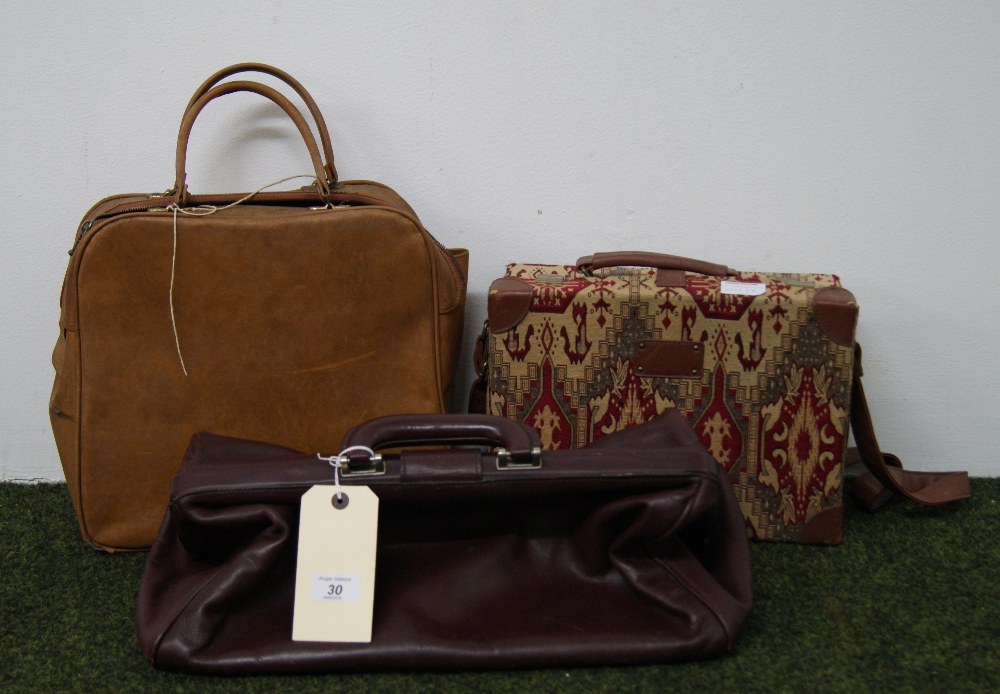 Leather Gladstone bag and others and a cased portable typewriter