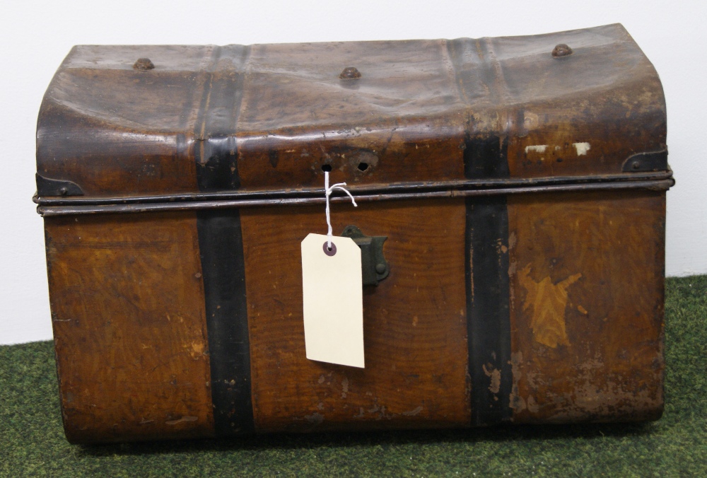 A vintage tin-trunk