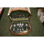 A mahogany-cased canteen of silver-plated cutlery