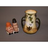 A Beswick novelty cruet set modelled as Laurel Hardy with a Royal Doulton vase DB191 CONDITION